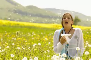 woman sneezing