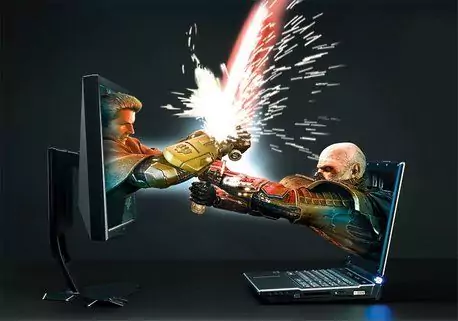 battle between laptop and desktop
