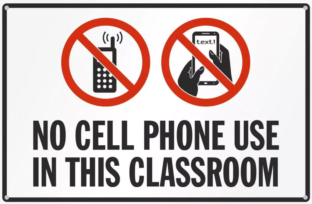 "No cell phone use" sign