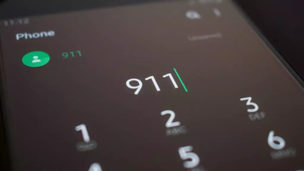 Emergency number 911 on the phone's screen
